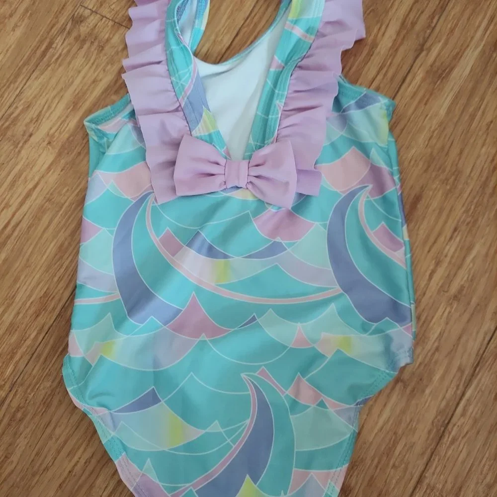 🎁 10/$25-1 piece Pastel and ruffle swimsuit, size 3T